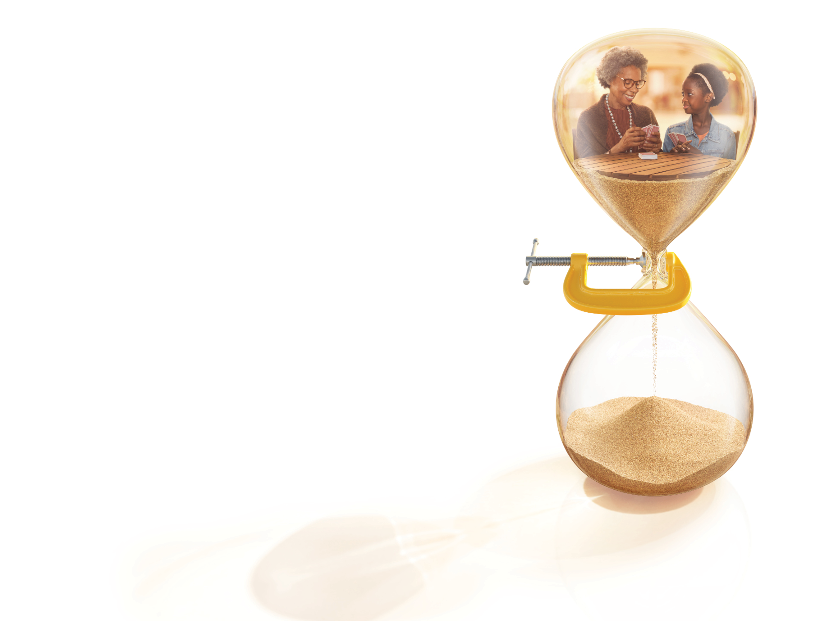 Grandmother and child playing cards in hourglass